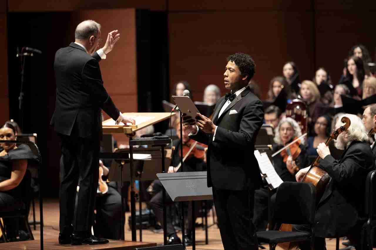Justin Austin, baritone, with Ted Sperling, conductor, The MasterVoices Chorus and Orchestra of St. Luke's. MasterVoices presents Sins and Grace, conceived and conducted by Ted Sperling, Alice Tully Hall, Lincoln Center, Monday, March 23, 2026. Credit Photo: Erin Baiano