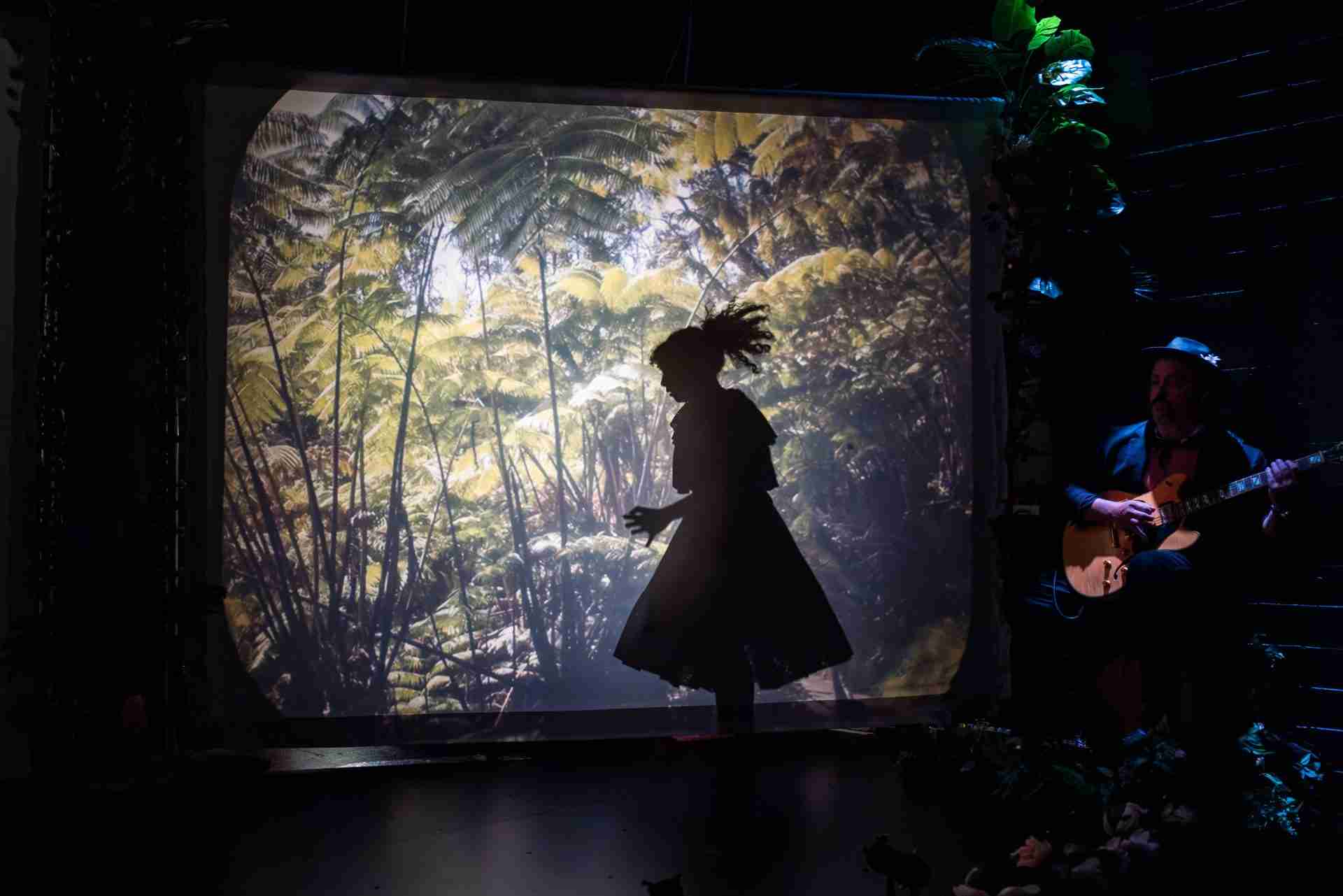 Samantha Blain as Lulu and Guitarist Claron Hayden in a scene from ISLA at the WP Theater in NYC. Photo by Rebecca J. Michelson