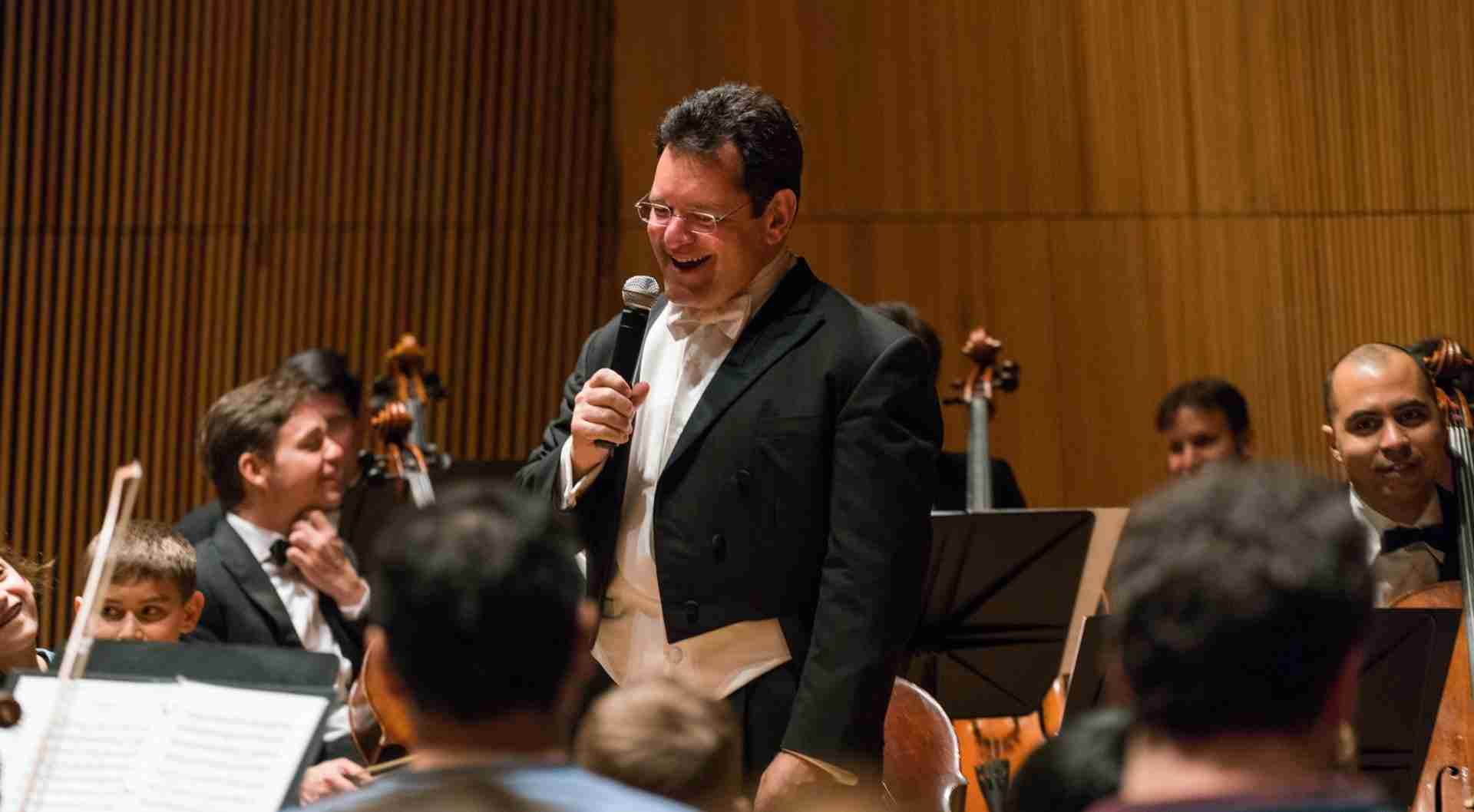 Conductor and Director David Bernard engaging with audience with The Park Avenue Chamber Symphony at the DiMenna Center for Classical Music, NYC. Courtesy chambersympony.com